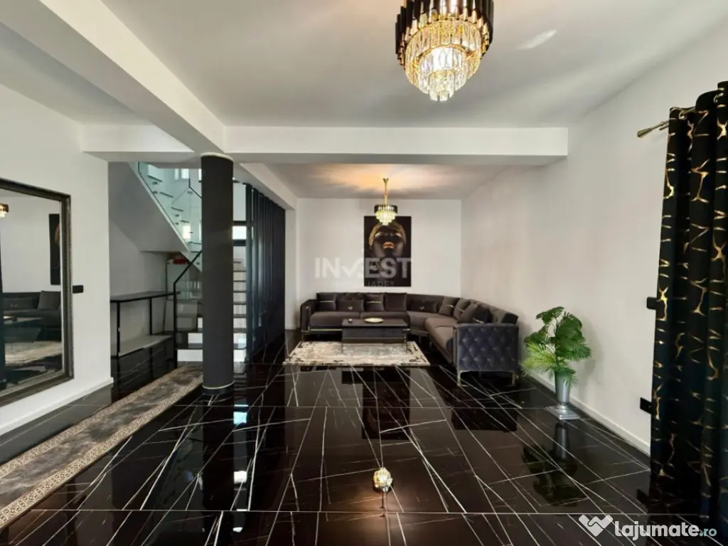 Vilă de vânzare cu design deosebit în cartierul Bucium 