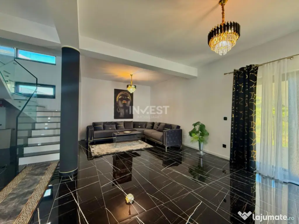 Vilă de vânzare cu design deosebit în cartierul Bucium 