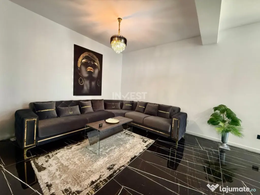 Vilă de vânzare cu design deosebit în cartierul Bucium 