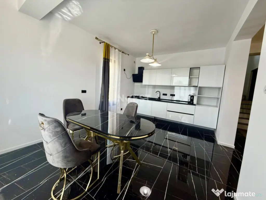 Vilă de vânzare cu design deosebit în cartierul Bucium 