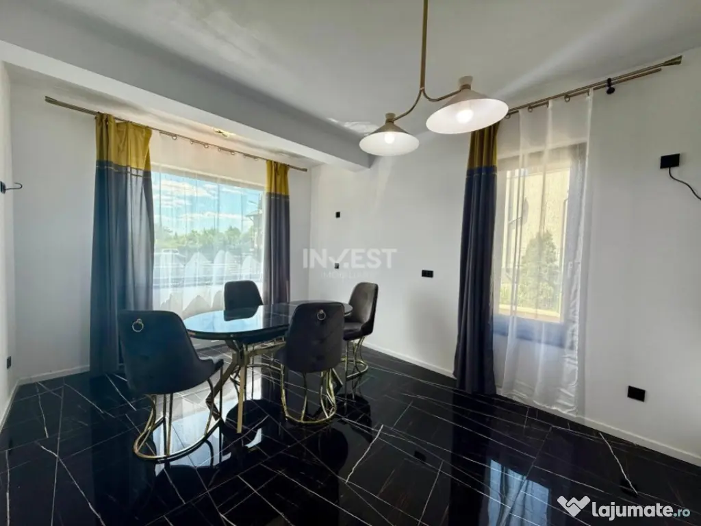 Vilă de vânzare cu design deosebit în cartierul Bucium 