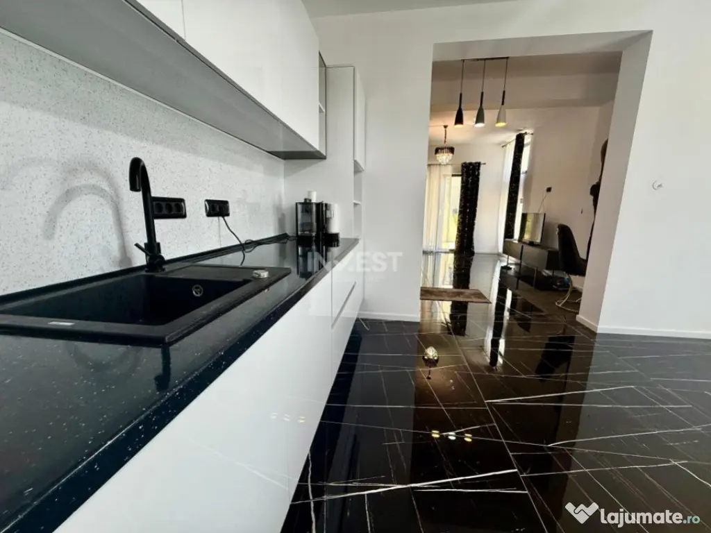 Vilă de vânzare cu design deosebit în cartierul Bucium 