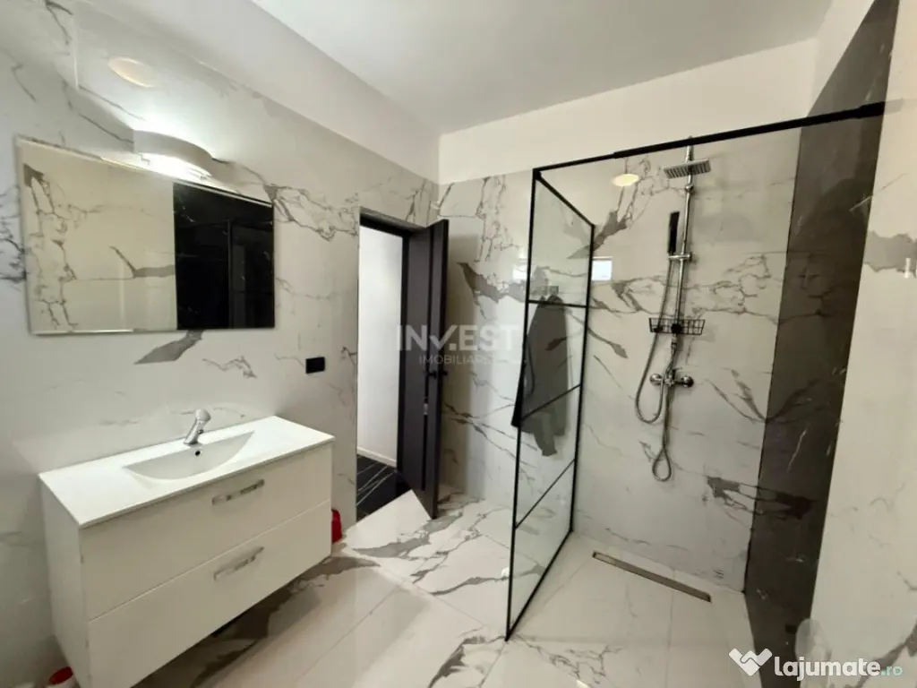 Vilă de vânzare cu design deosebit în cartierul Bucium 