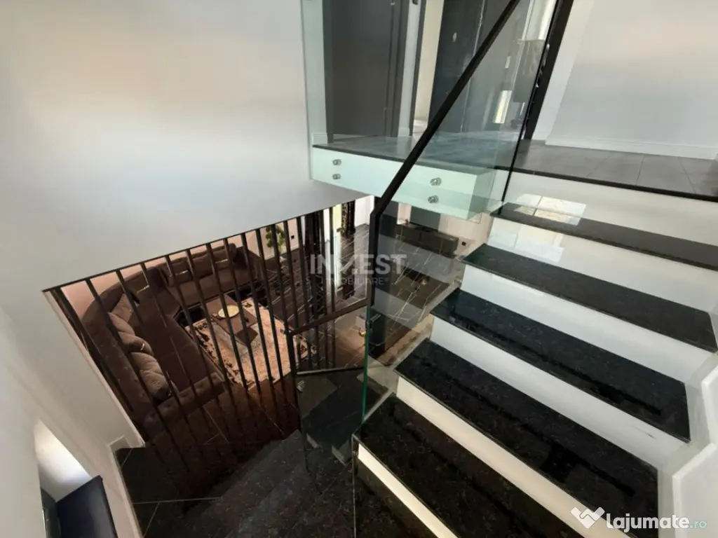 Vilă de vânzare cu design deosebit în cartierul Bucium 