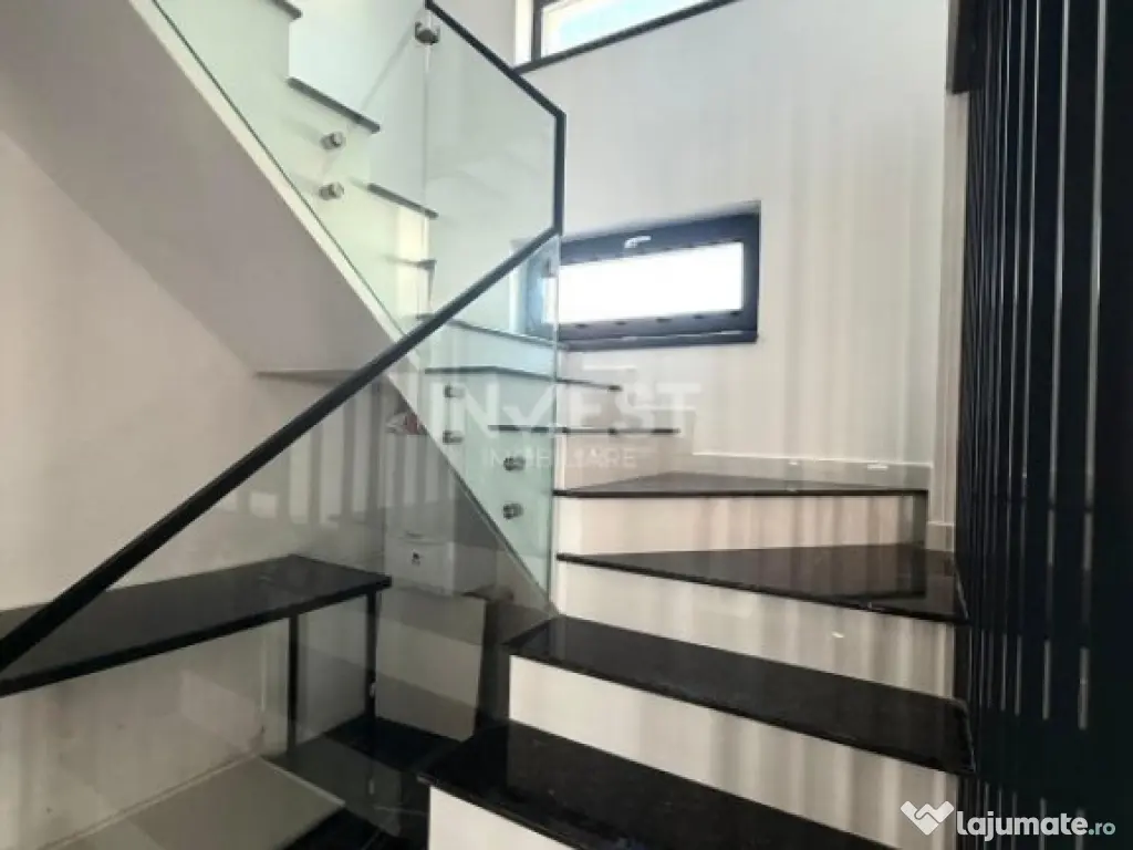 Vilă de vânzare cu design deosebit în cartierul Bucium 