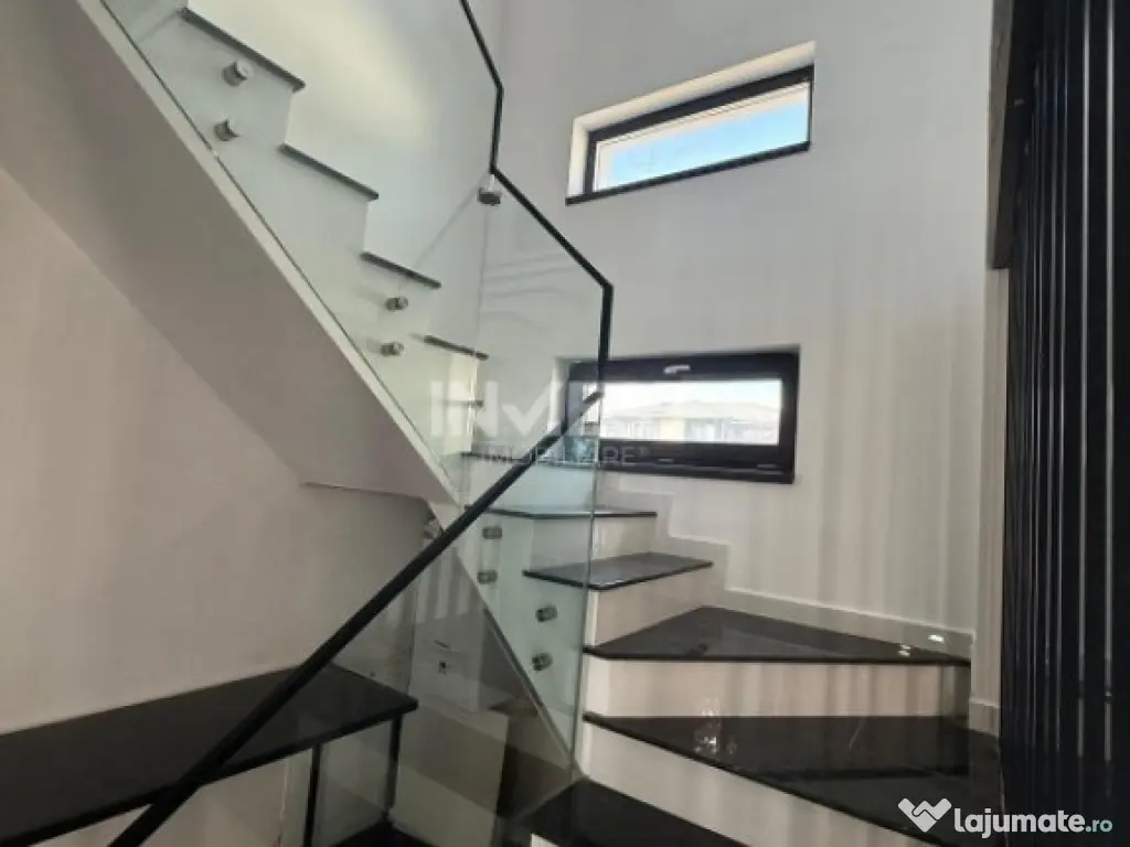 Vilă de vânzare cu design deosebit în cartierul Bucium 