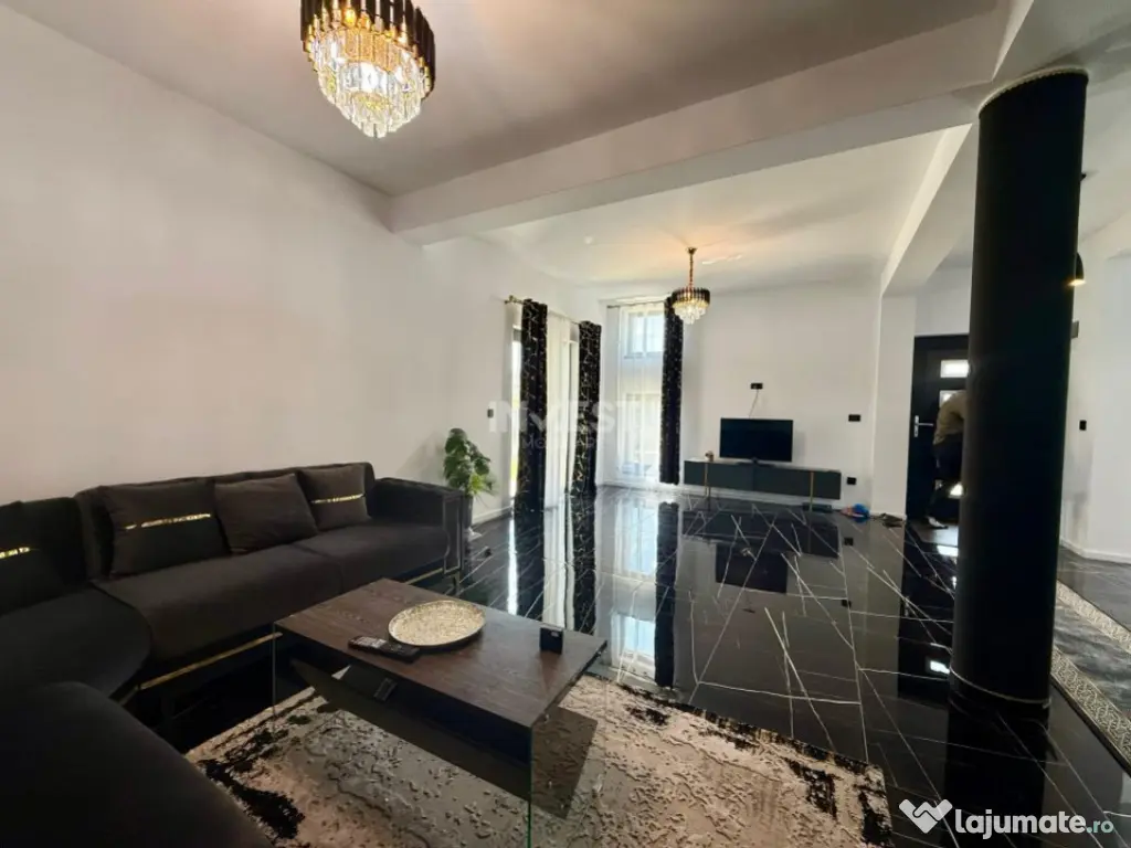 Vilă de vânzare cu design deosebit în cartierul Bucium 