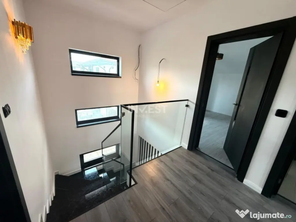 Vilă de vânzare cu design deosebit în cartierul Bucium 