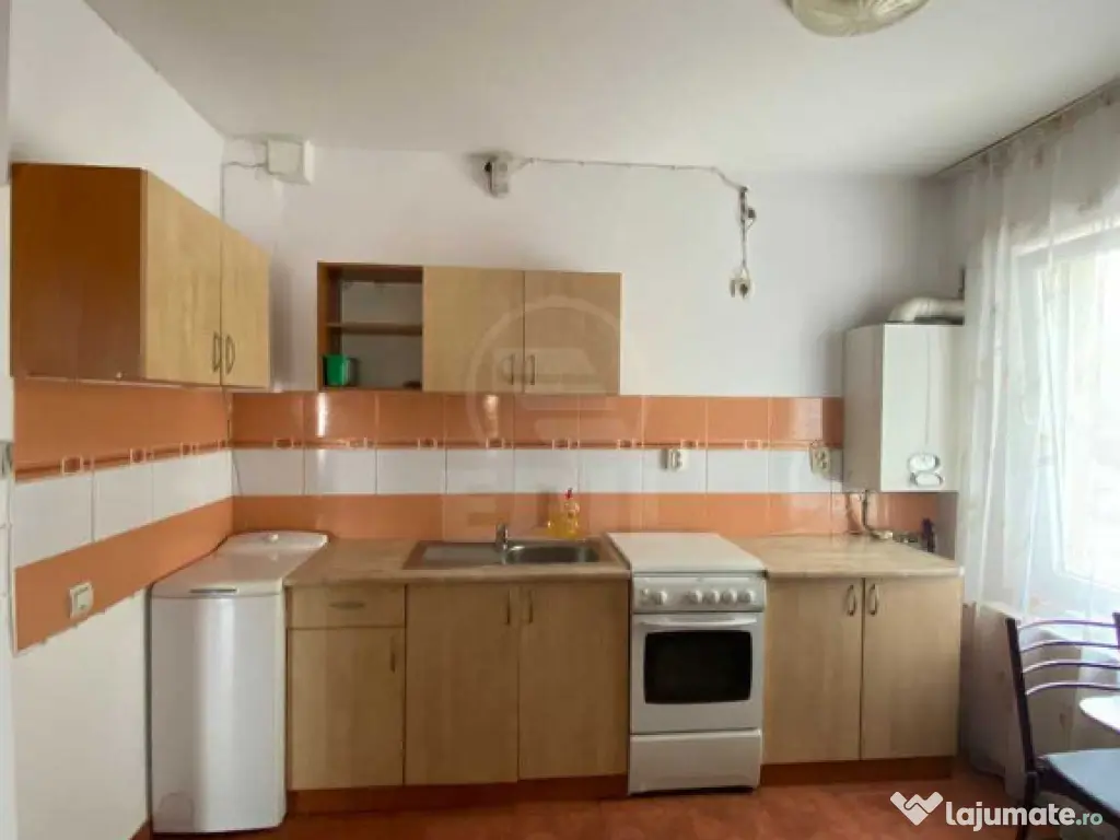 Apartament 2 camere,etaj 1,decomandat,zona Florilor