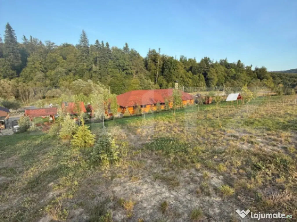 Cabana din lemn rotund, 2 camere, 140 mp, teren 2800 mp, Pal 