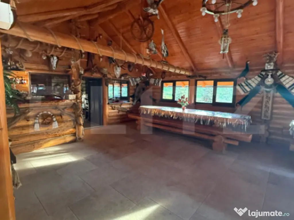 Cabana din lemn rotund, 2 camere, 140 mp, teren 2800 mp, Pal 