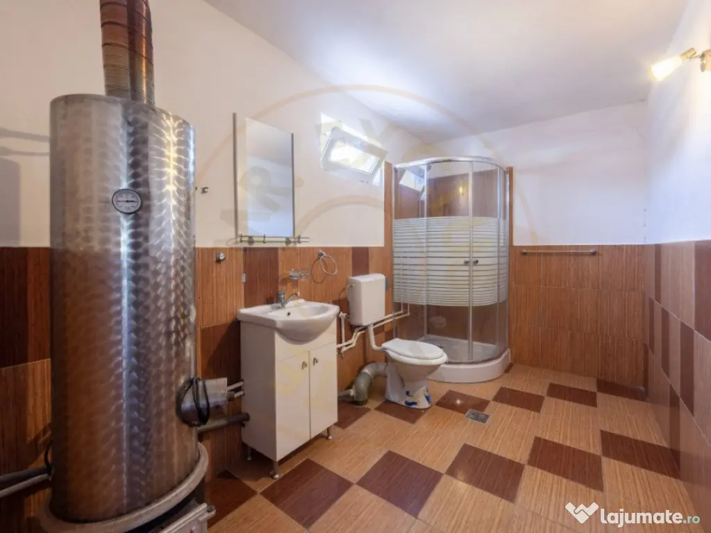 Casa cu teren generos si gradina spectaculoasa – Comuna Cu