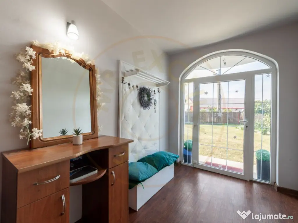 Casa cu teren generos si gradina spectaculoasa – Comuna Cu