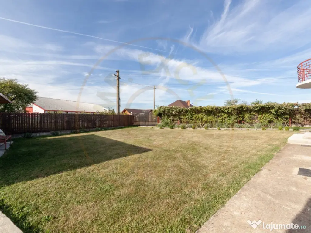 Casa cu teren generos si gradina spectaculoasa – Comuna Cu