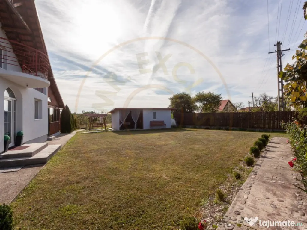 Casa cu teren generos si gradina spectaculoasa – Comuna Cu