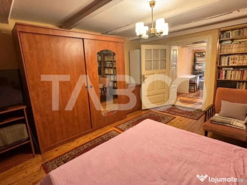 Casa de vanzare cu curte spatioasa loc relaxare si gradina C