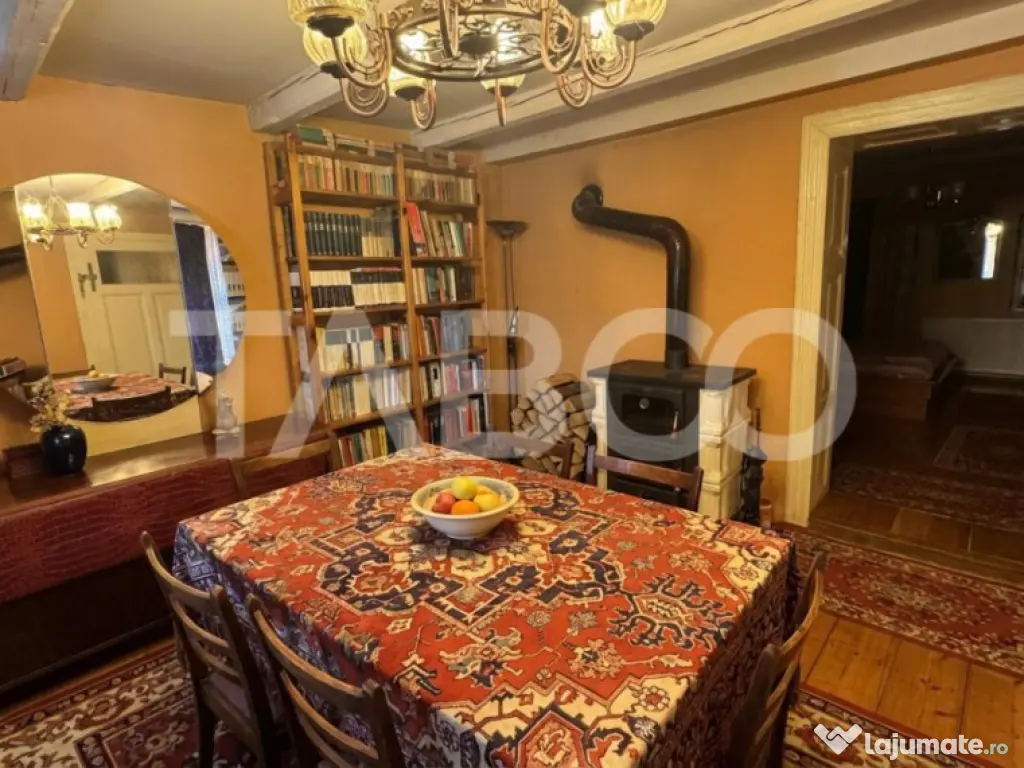 Casa de vanzare cu curte spatioasa loc relaxare si gradina C