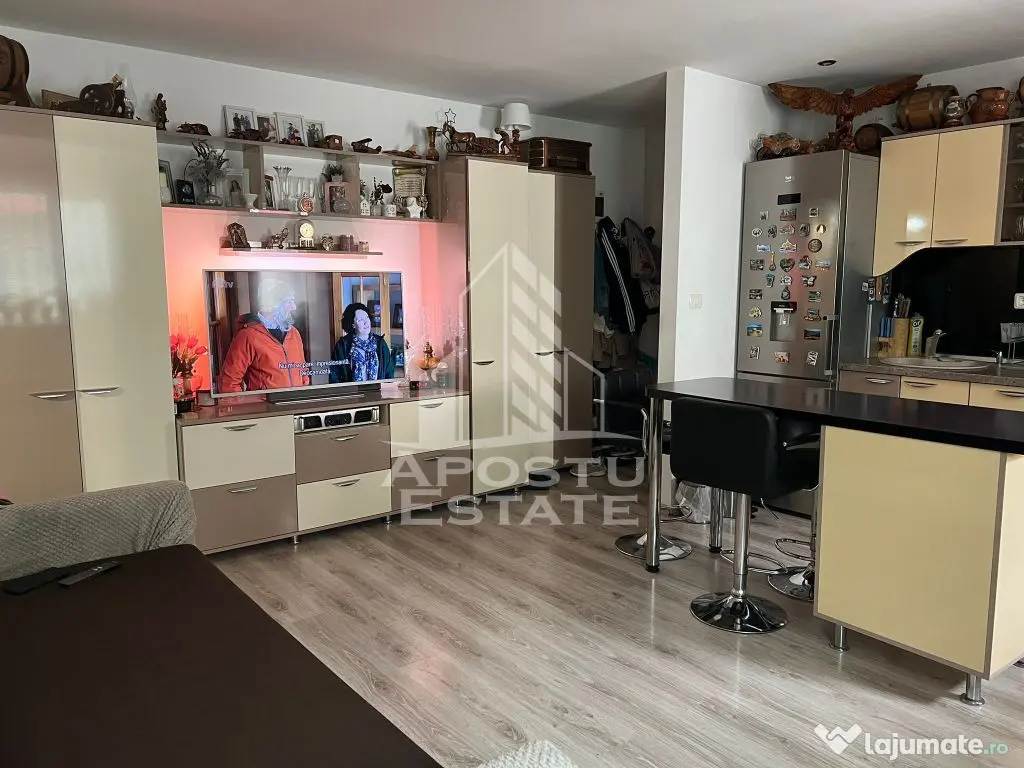 Apartament cu 2 camere complet mobilat si utilat la etaju... 