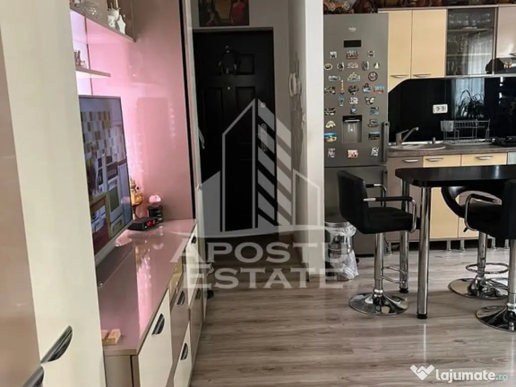 Apartament cu 2 camere complet mobilat si utilat la etaju... 