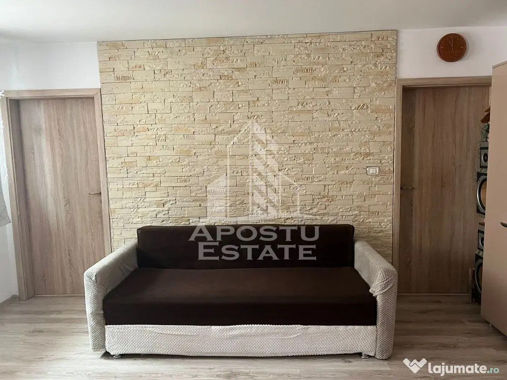 Apartament cu 2 camere complet mobilat si utilat la etaju... 