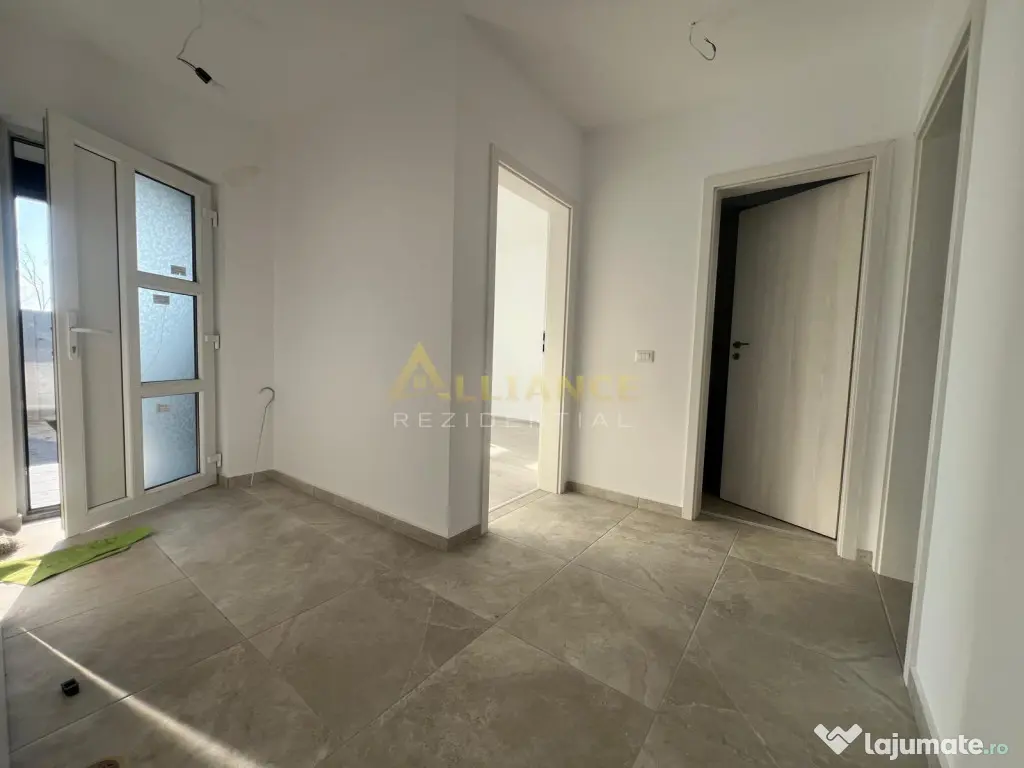 De casa pe parter - 3 camere, 2 bai, teren 376 mp