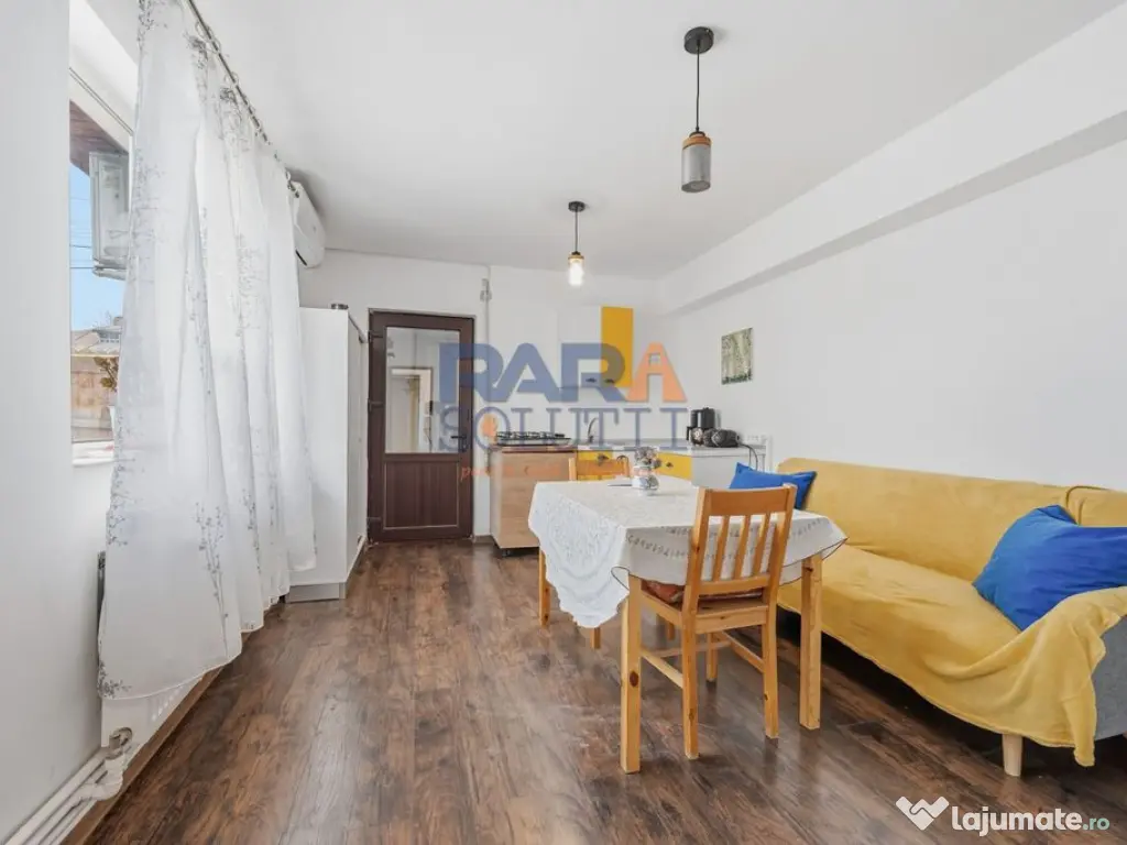 Casă micuță + un pic de curte 