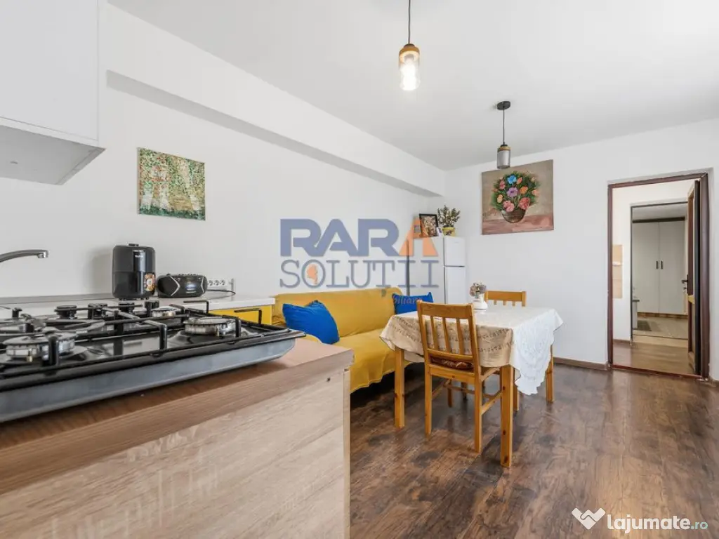 Casă micuță + un pic de curte 