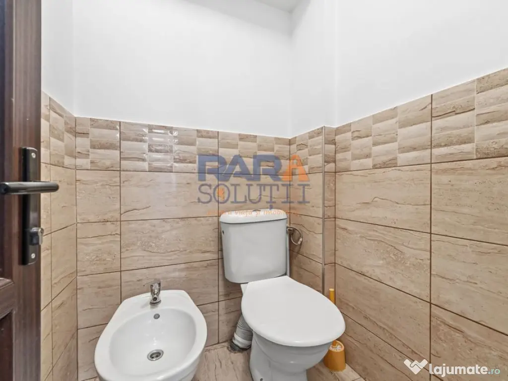 Casă micuță + un pic de curte 