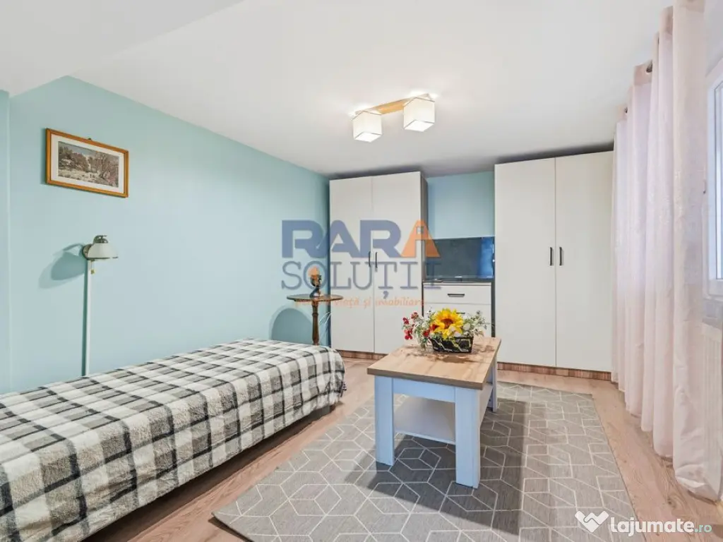 Casă micuță + un pic de curte 