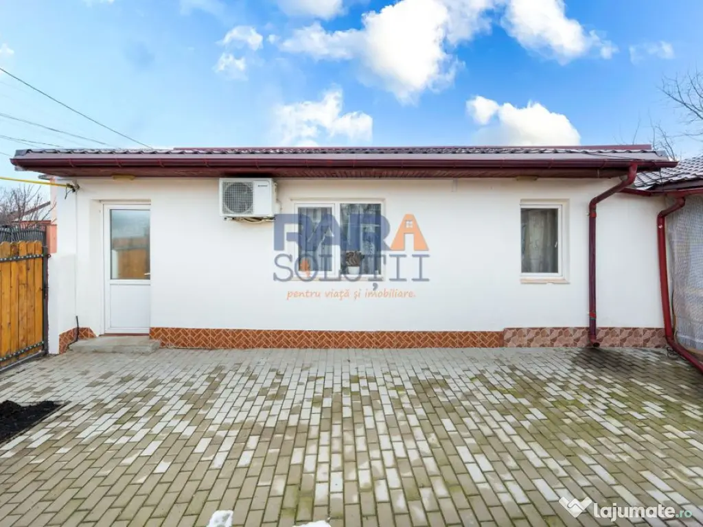 Casă micuță + un pic de curte 