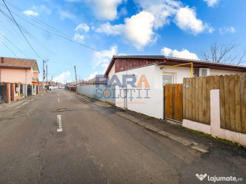 Casă micuță + un pic de curte 