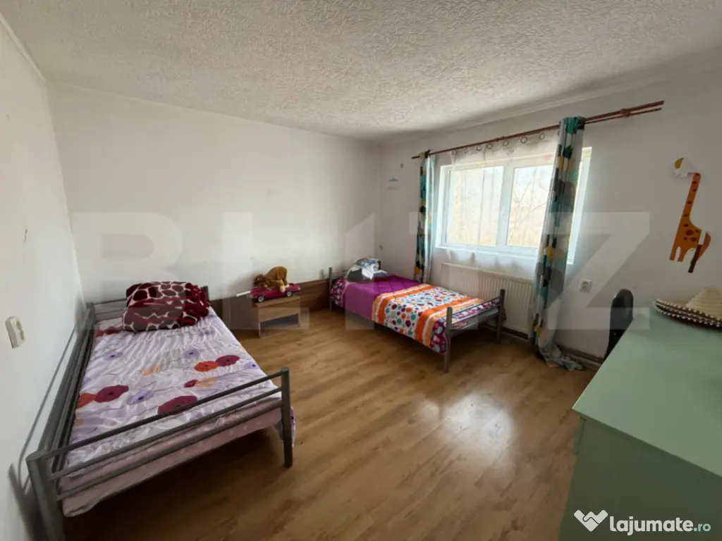 Casă de vânzare Păulești – 4 camere, teren generos 