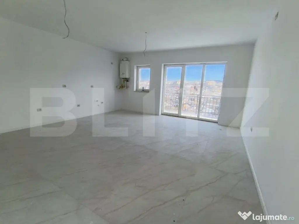 Apartament cu 3 camere, in suprafata de 85 mp si teren de 10 