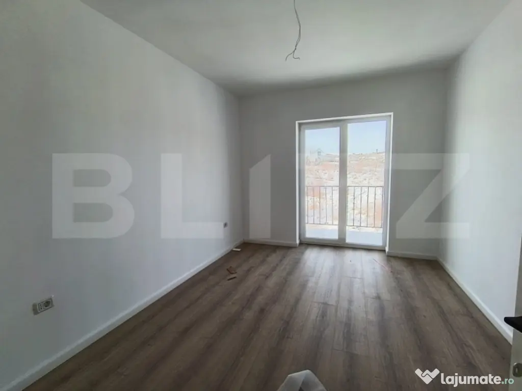 Apartament cu 3 camere, in suprafata de 85 mp si teren de 10 