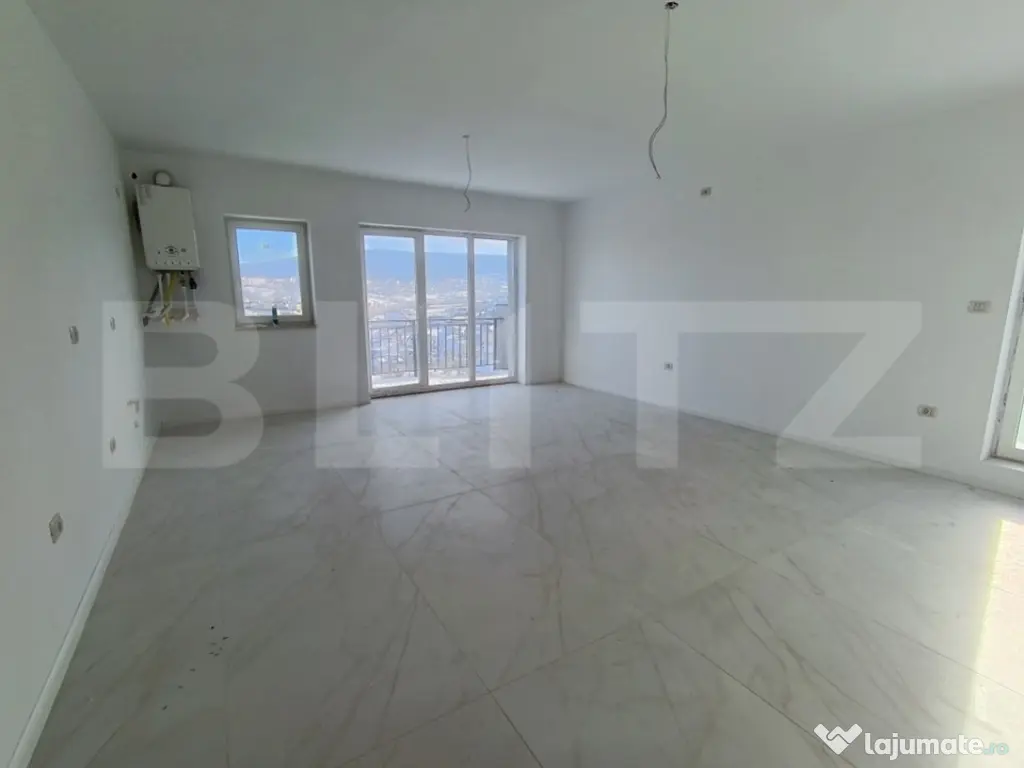 Apartament cu 3 camere, in suprafata de 85 mp si teren de 10 