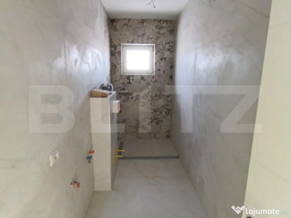 Apartament cu 3 camere, in suprafata de 85 mp si teren de 10 