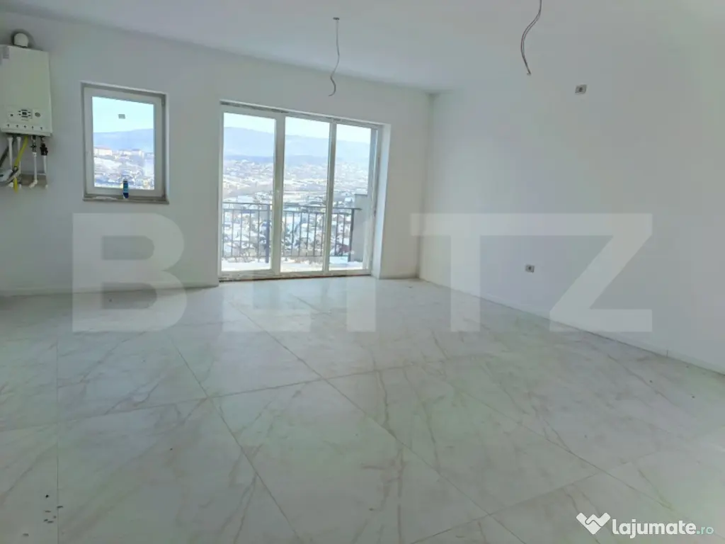 Apartament cu 3 camere, in suprafata de 85 mp si teren de 10 