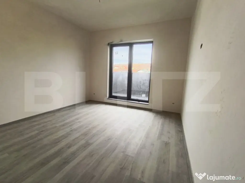 Apartament cu 3 camere, in suprafata de 85 mp si teren de 10 