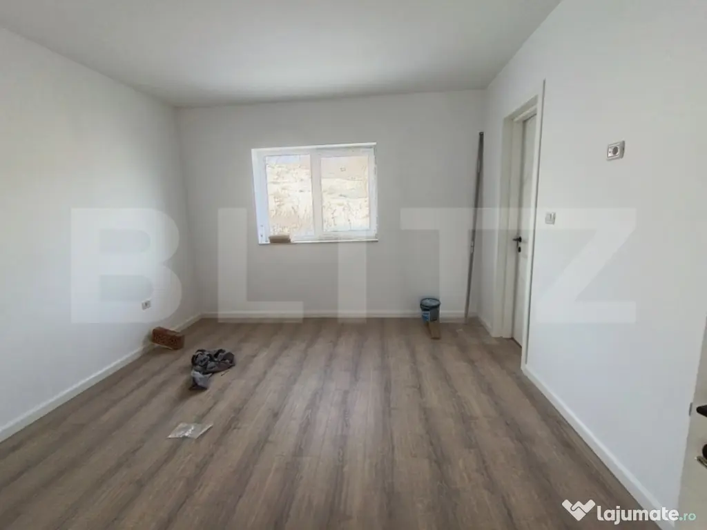 Apartament cu 3 camere, in suprafata de 85 mp si teren de 10 