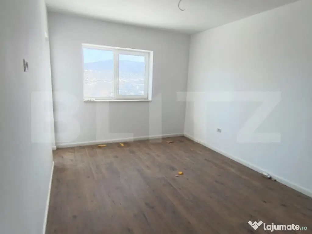 Apartament cu 3 camere, in suprafata de 85 mp si teren de 10 