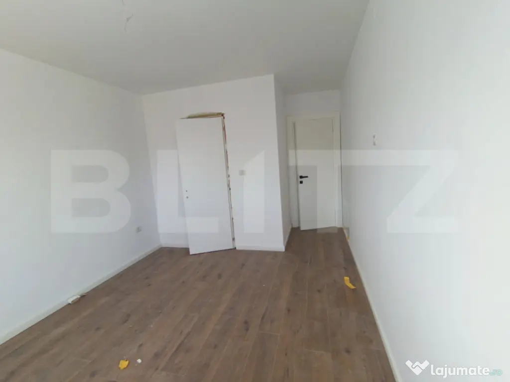 Apartament cu 3 camere, in suprafata de 85 mp si teren de 10 