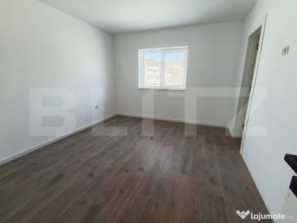 Apartament cu 3 camere, in suprafata de 85 mp si teren de 10 