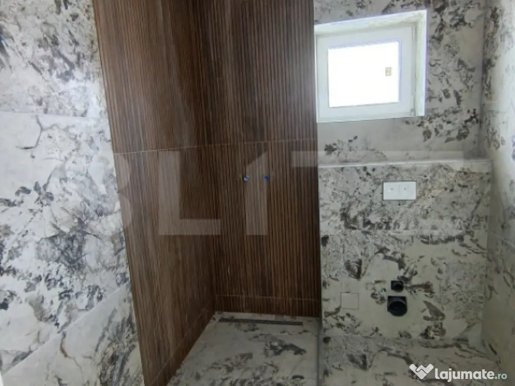 Apartament cu 3 camere, in suprafata de 85 mp si teren de 10 