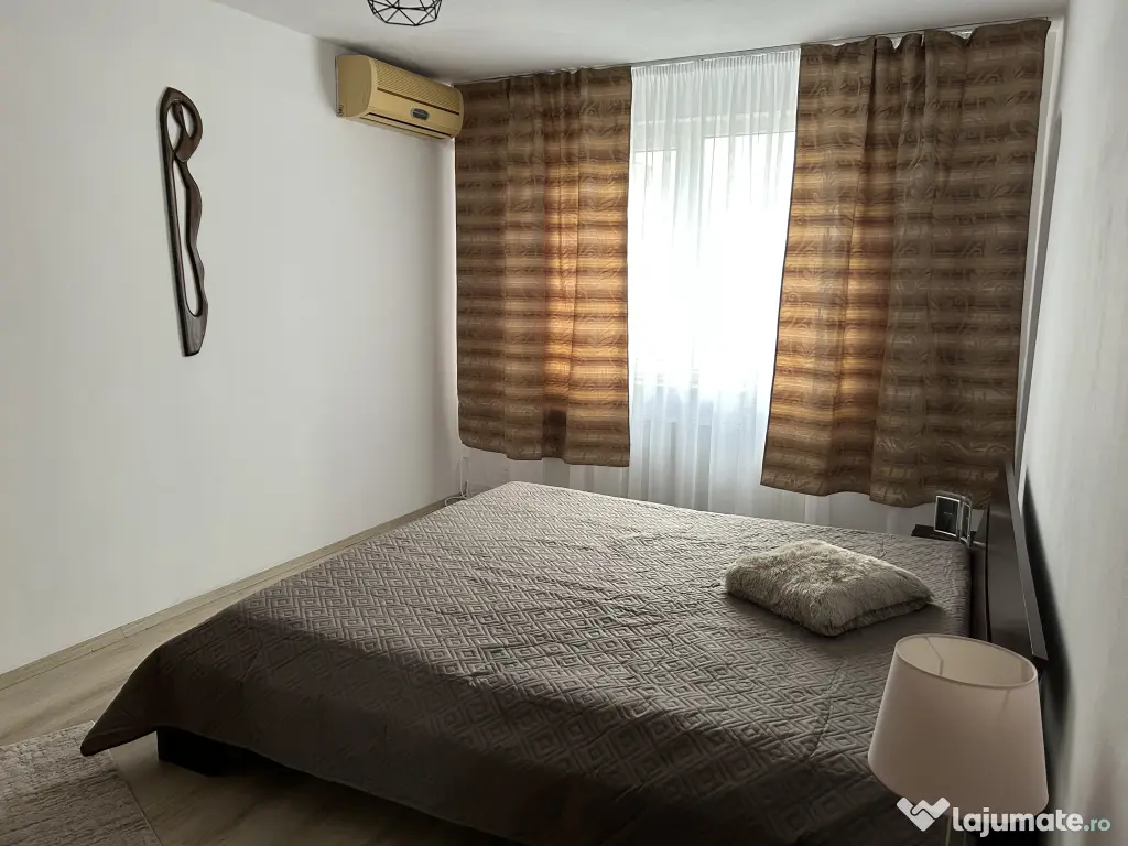 Închiriez apartament cu două camere zona Auchan Titan 