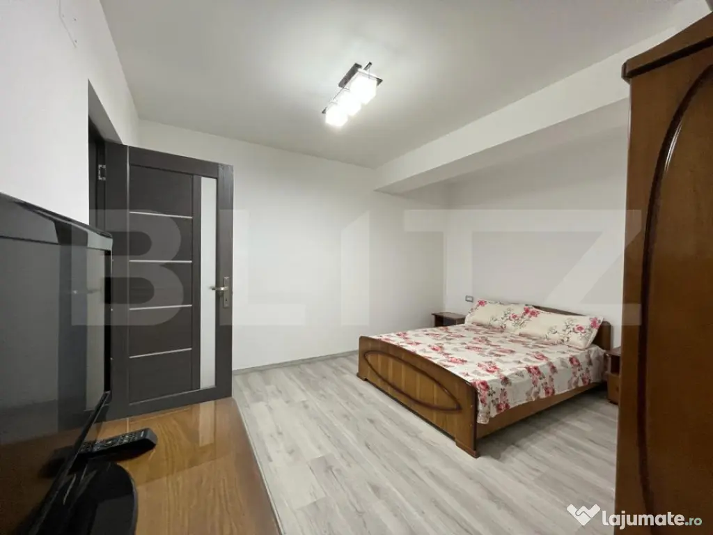 Apartament modern cu două camere, centrala si loc de parcar 
