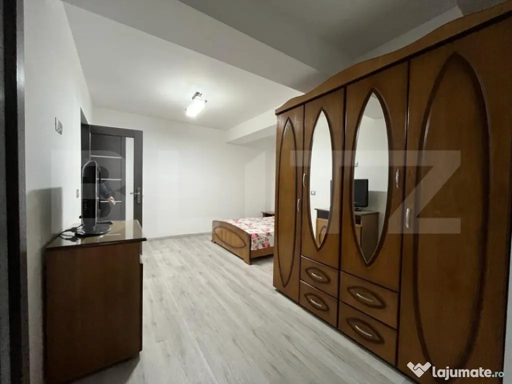 Apartament modern cu două camere, centrala si loc de parcar 