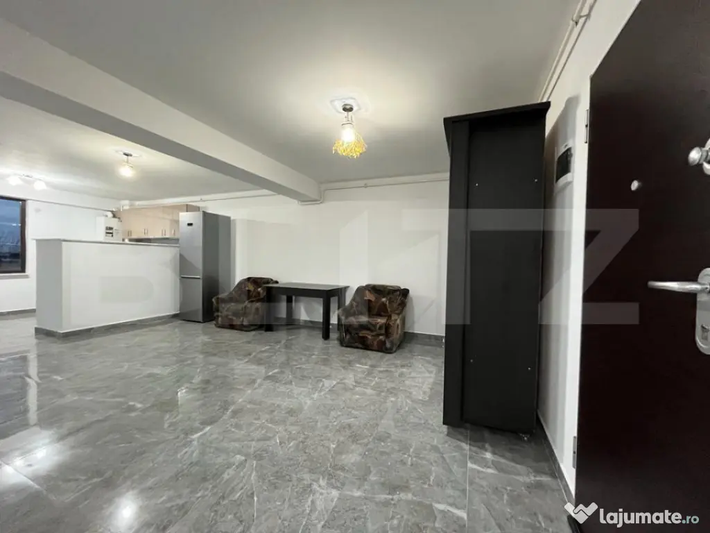 Apartament modern cu două camere, centrala si loc de parcar 
