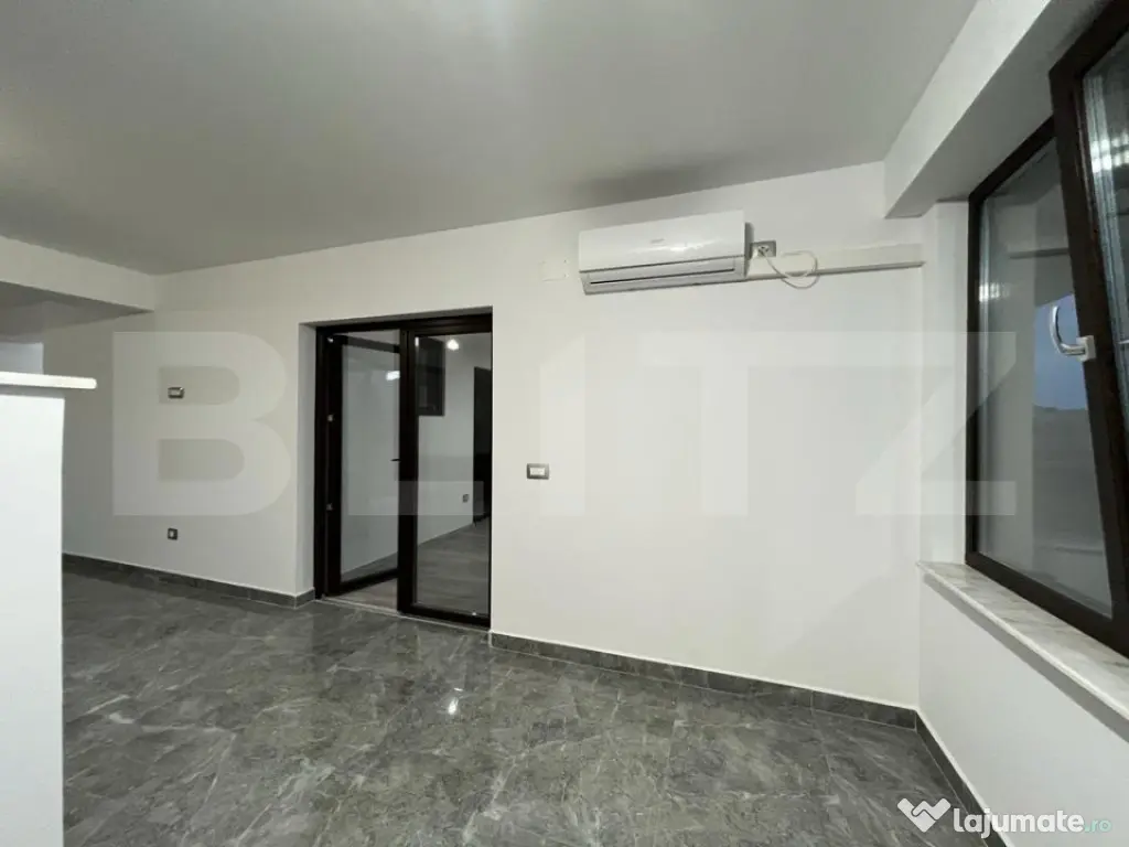 Apartament modern cu două camere, centrala si loc de parcar 