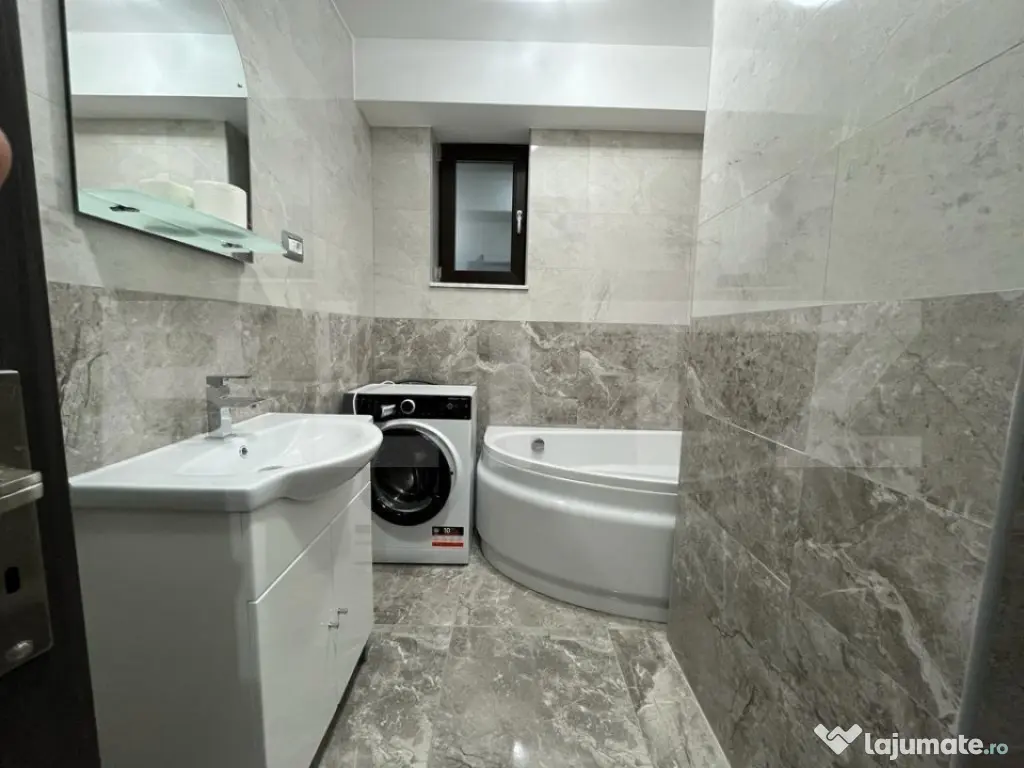 Apartament modern cu două camere, centrala si loc de parcar 