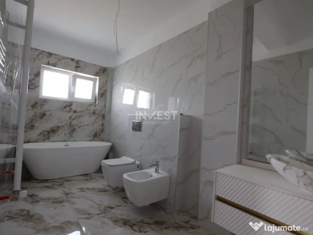 Casa 4 camere, teren intre 350-543 mp la strada asfaltata di 